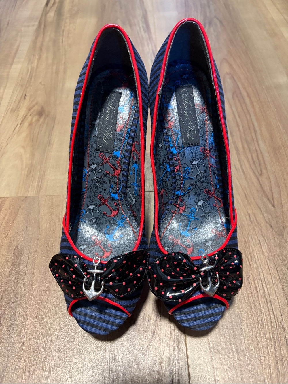 Iron Fist Heels with Red Trim and Bow - Women Shoes